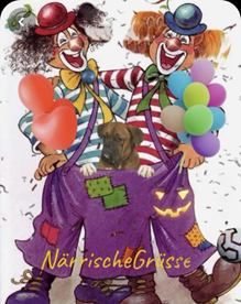 Due clown che si abbracciano e si divertono